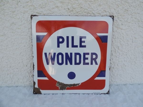 Plaque émaillée PILE WONDER