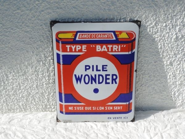 Plaque émaillée Pile Wonder